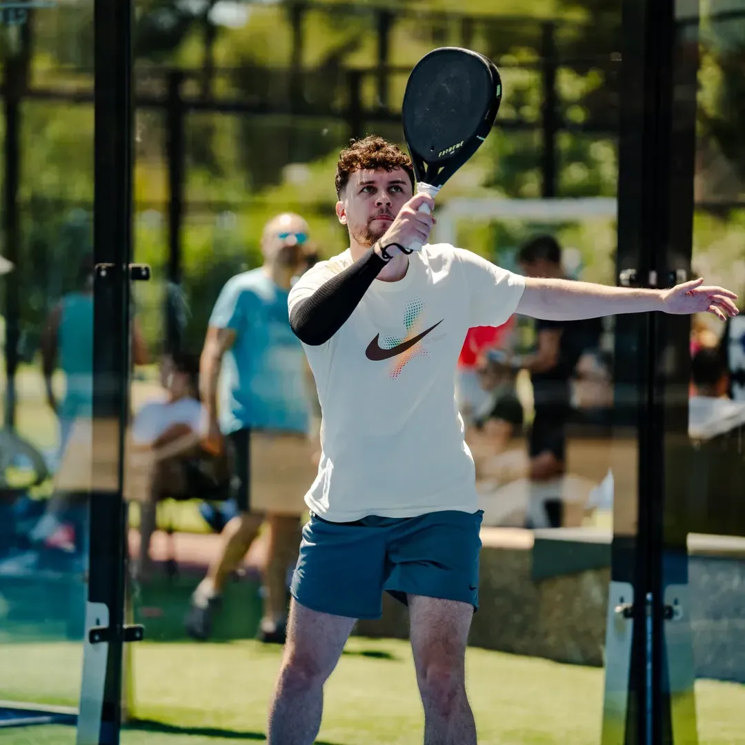 Action shot from a competitive padel game in Zagreb